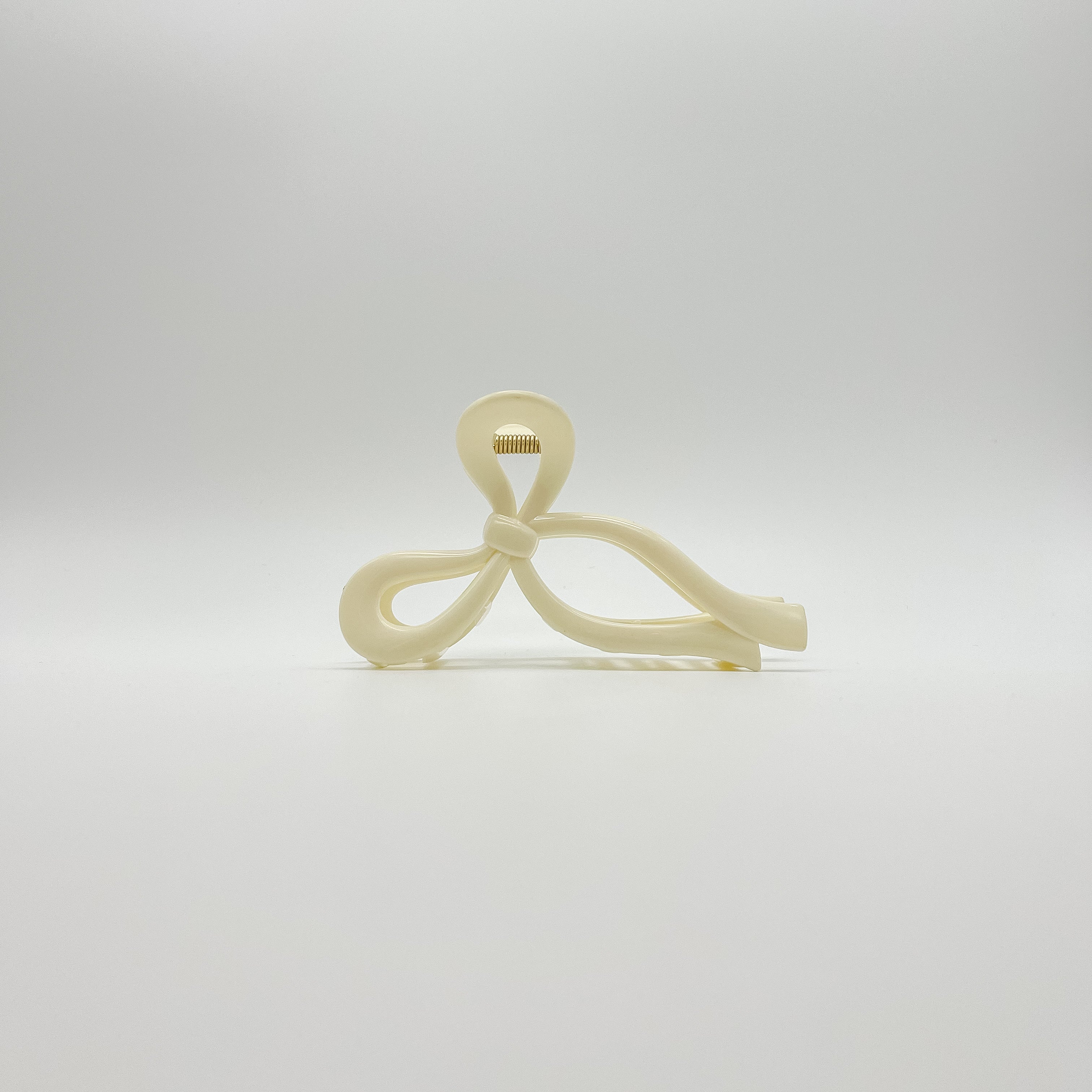 Pink hair clip, orange hair clip, bow hair clip, bow claw clip, hair clip, claw clip, hair accessories, small business, essbe, michigan, women owned, coquette accessories