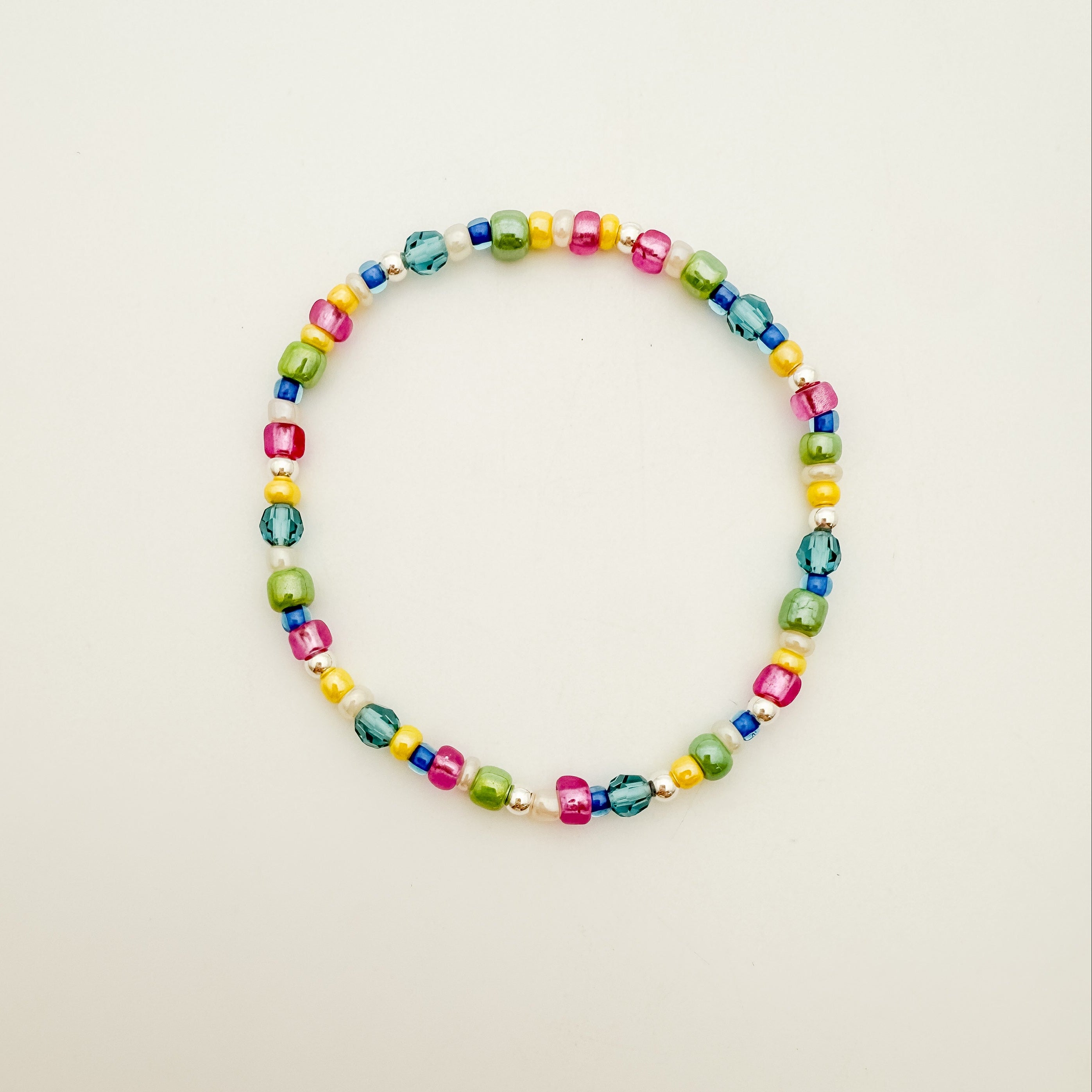 colorful bracelet, beaded bracelet, elastic bracelet, handmade bracelet, hand beaded bracelet, small business, Michigan made, sterling silver jewelry, summer bracelet