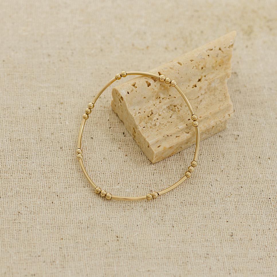 14k gold-filled beaded bracelet, bracelet with texture, bracelet stack, essbe, michigan made, beaded bracelet, elastic bracelet, handmade, stackable bracelet, small business, dot and dash bracelet