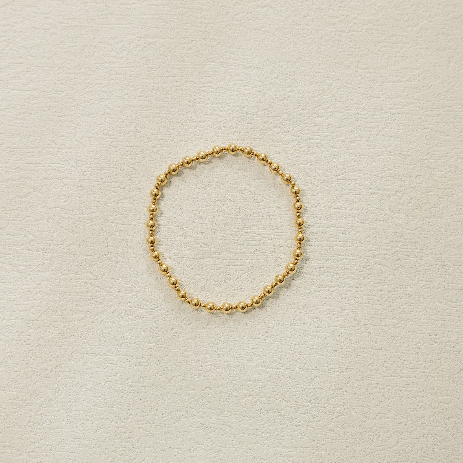 gold filled, bracelet, beaded bracelets, handmade, small business, women owned, dainty jewelry, elastic bracelet, gold beads, thalia beaded bracelet