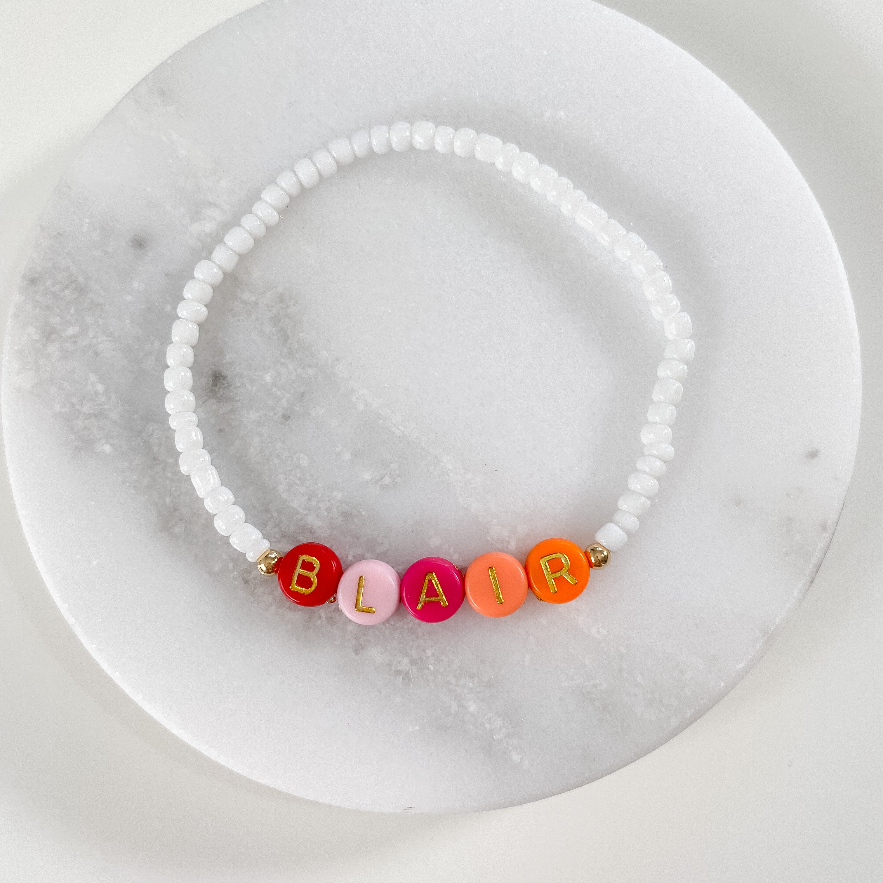 Personalized bracelets, elastic bracelets, beaded bracelet, gold-filled bracelet, dainty bracelet, handmade, essbe, small business, name bracelet, letter bead bracelets