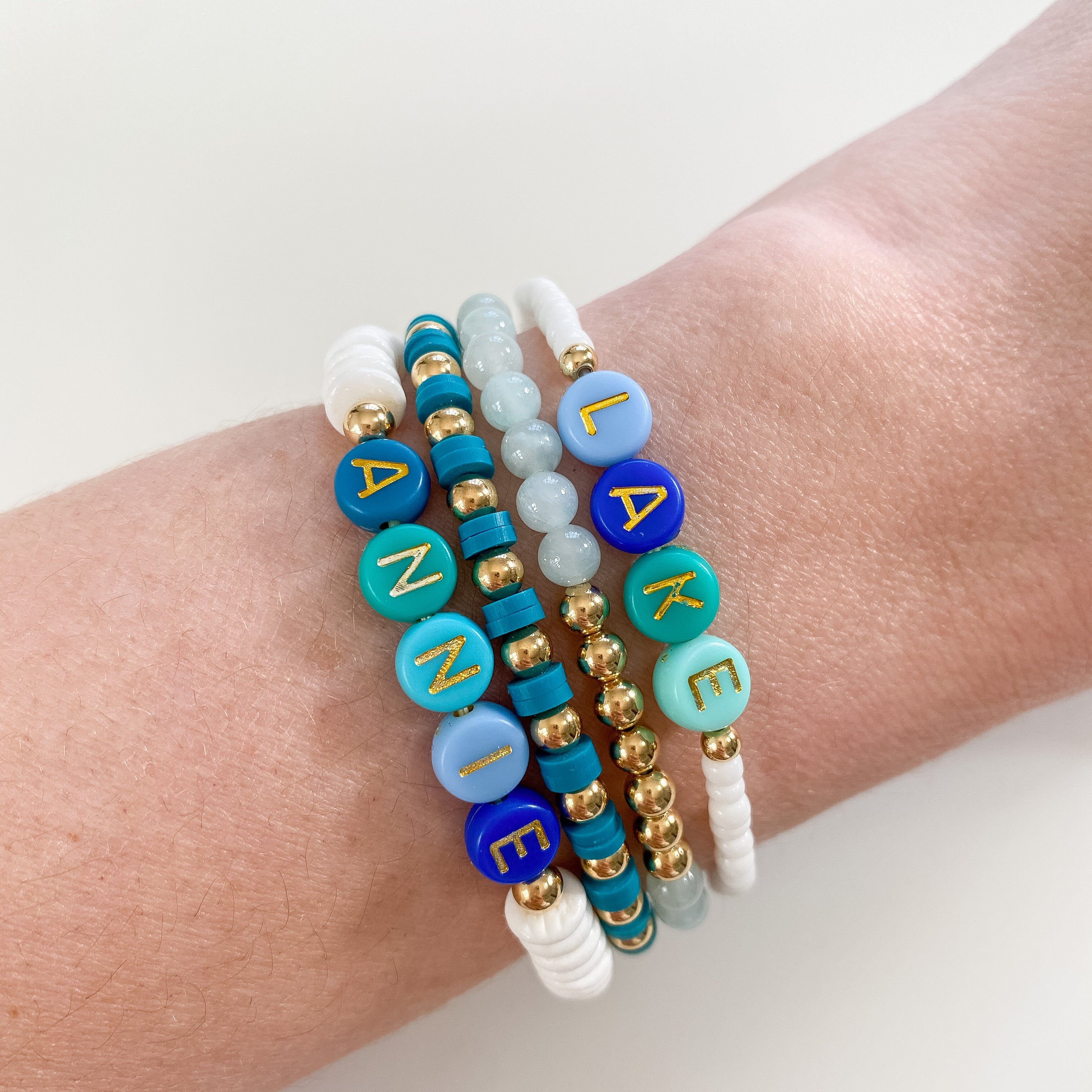 Personalized bracelets, elastic bracelets, beaded bracelet, gold-filled bracelet, dainty bracelet, handmade, essbe, small business, name bracelet, letter bead bracelets