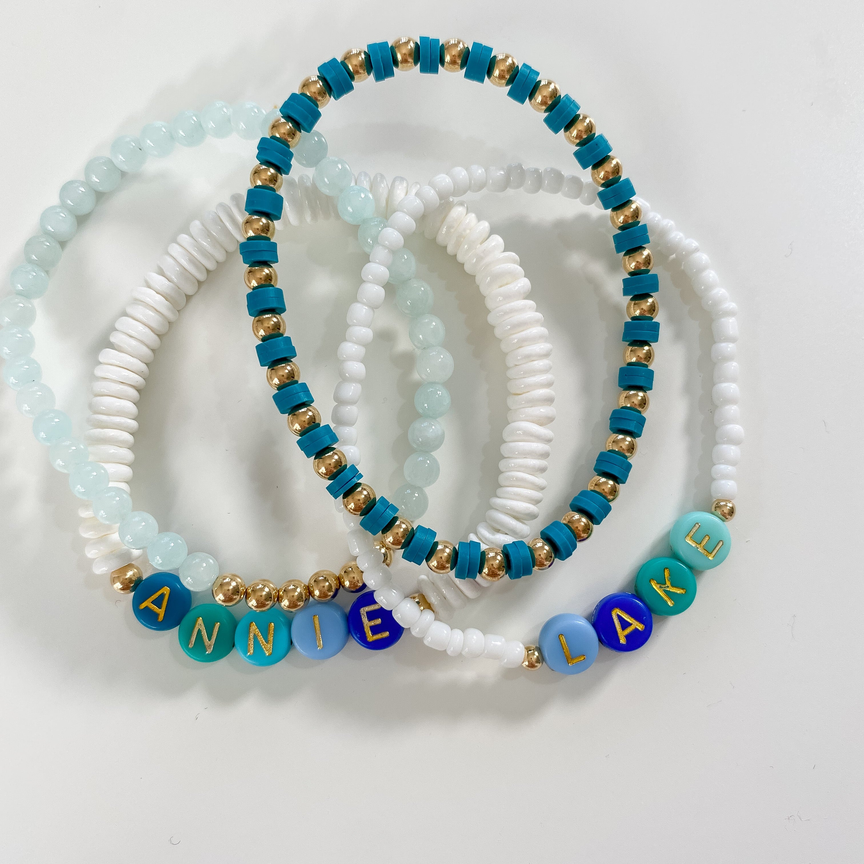 Personalized bracelets, elastic bracelets, beaded bracelet, gold-filled bracelet, dainty bracelet, handmade, essbe, small business, name bracelet, letter bead bracelets