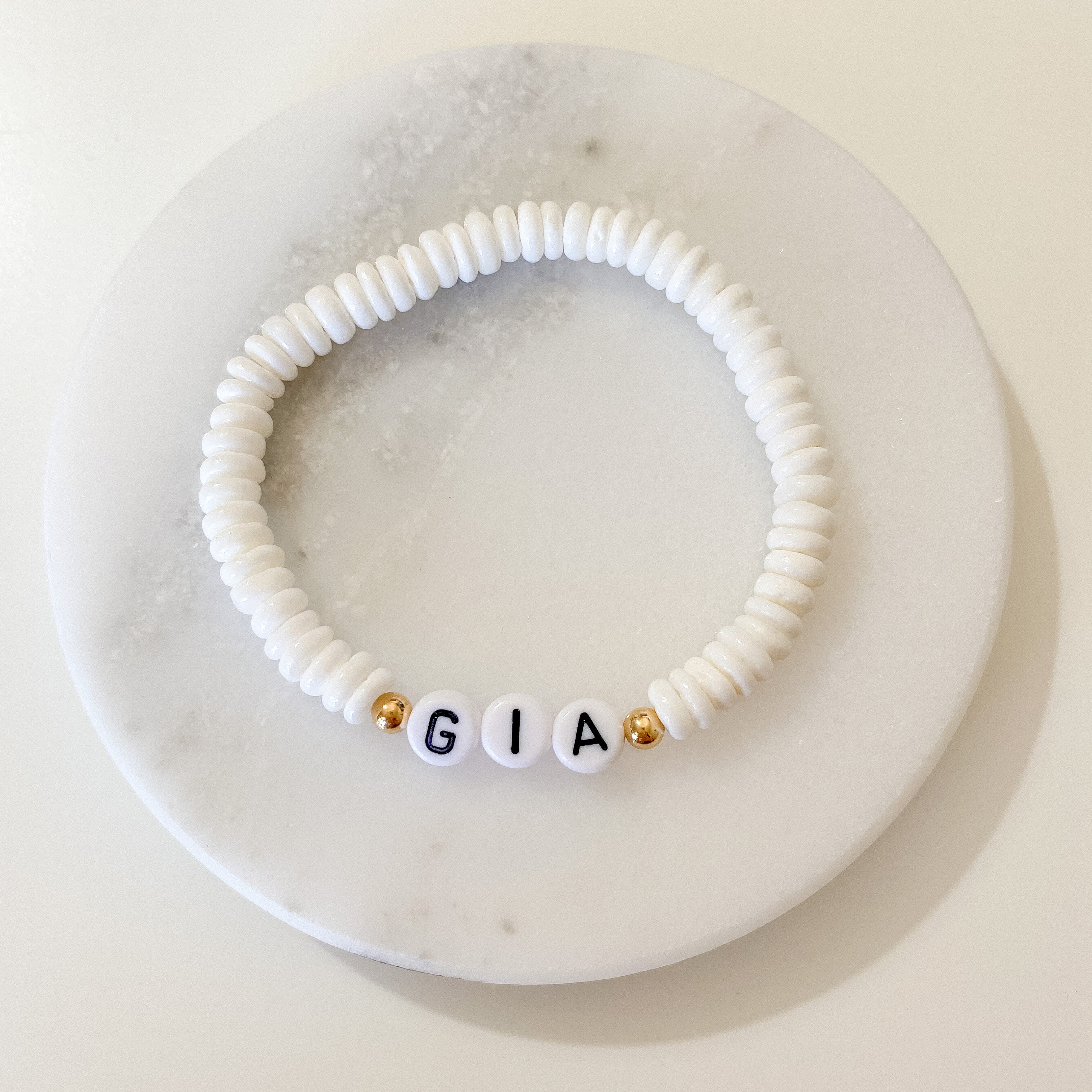 Personalized bracelets, elastic bracelets, beaded bracelet, gold-filled bracelet, dainty bracelet, handmade, essbe, small business, name bracelet, letter bead bracelets