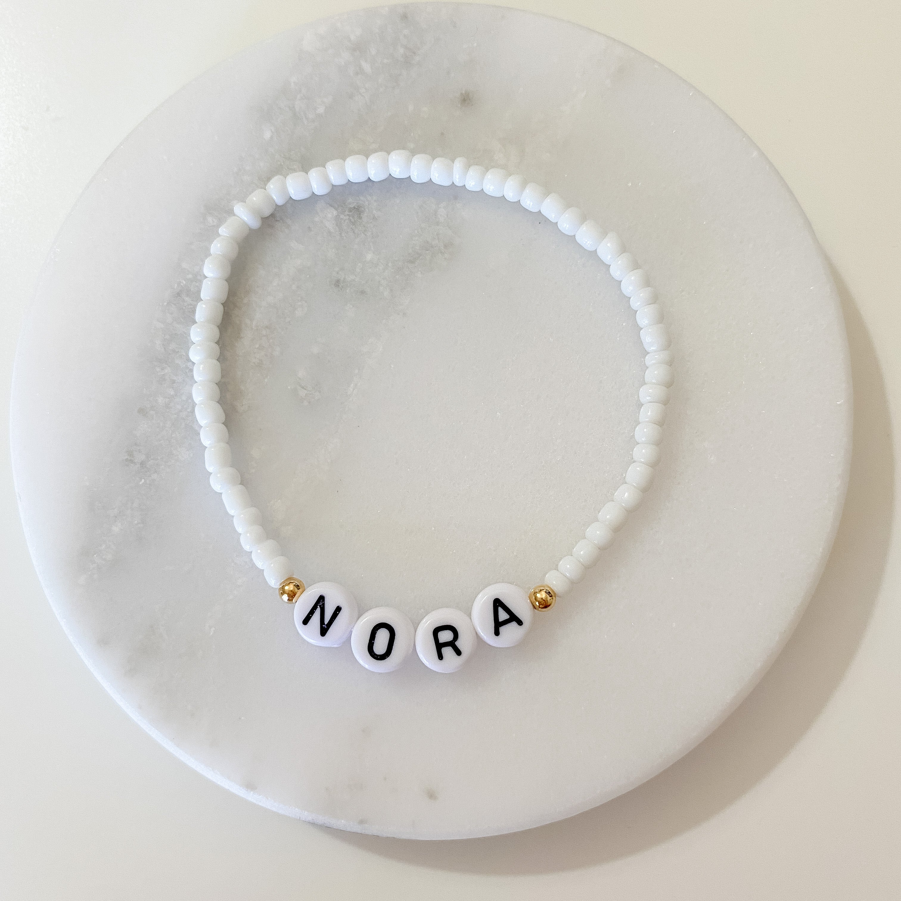 Personalized bracelets, elastic bracelets, beaded bracelet, gold-filled bracelet, dainty bracelet, handmade, essbe, small business, name bracelet, letter bead bracelets