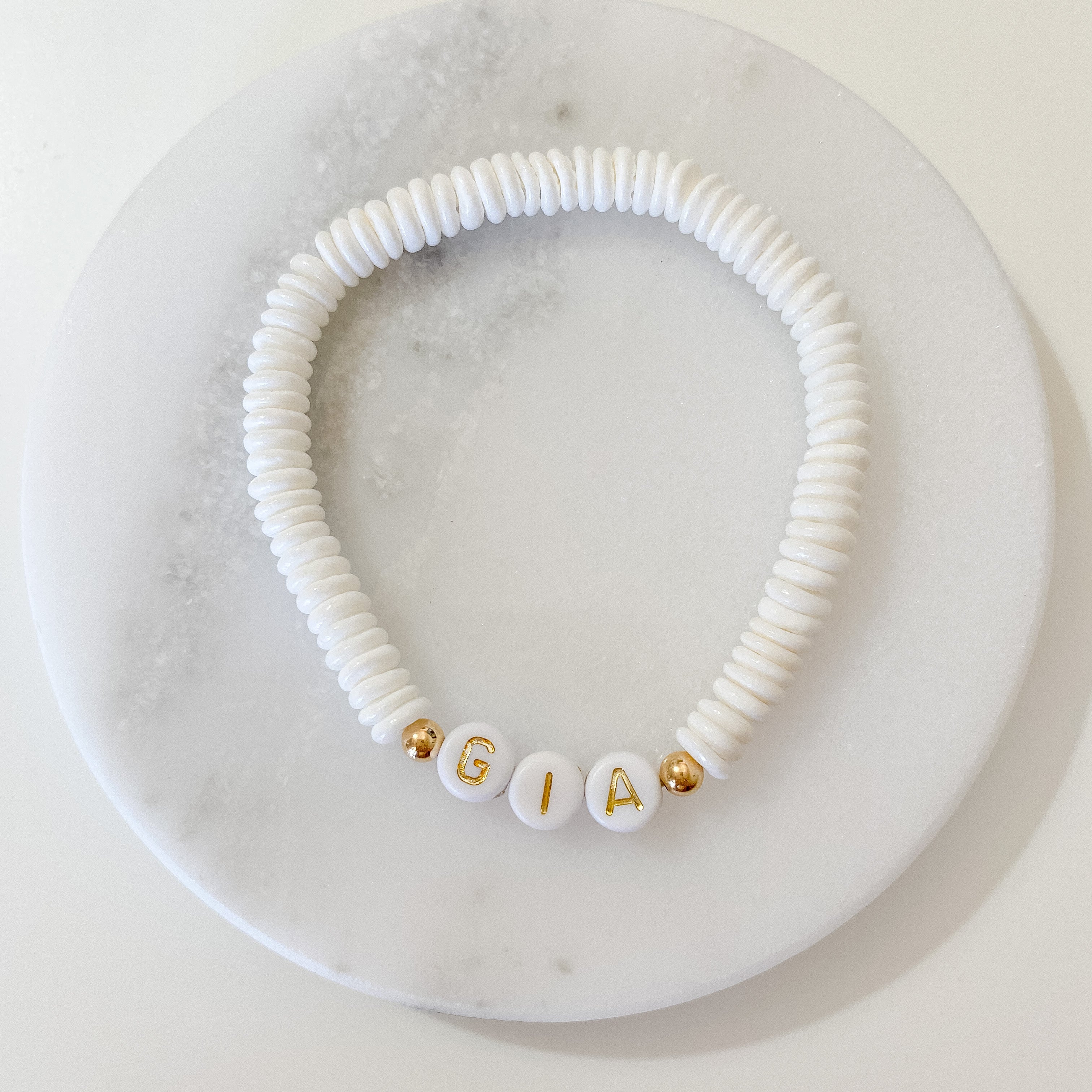 Personalized bracelets, elastic bracelets, beaded bracelet, gold-filled bracelet, dainty bracelet, handmade, essbe, small business, name bracelet, letter bead bracelets