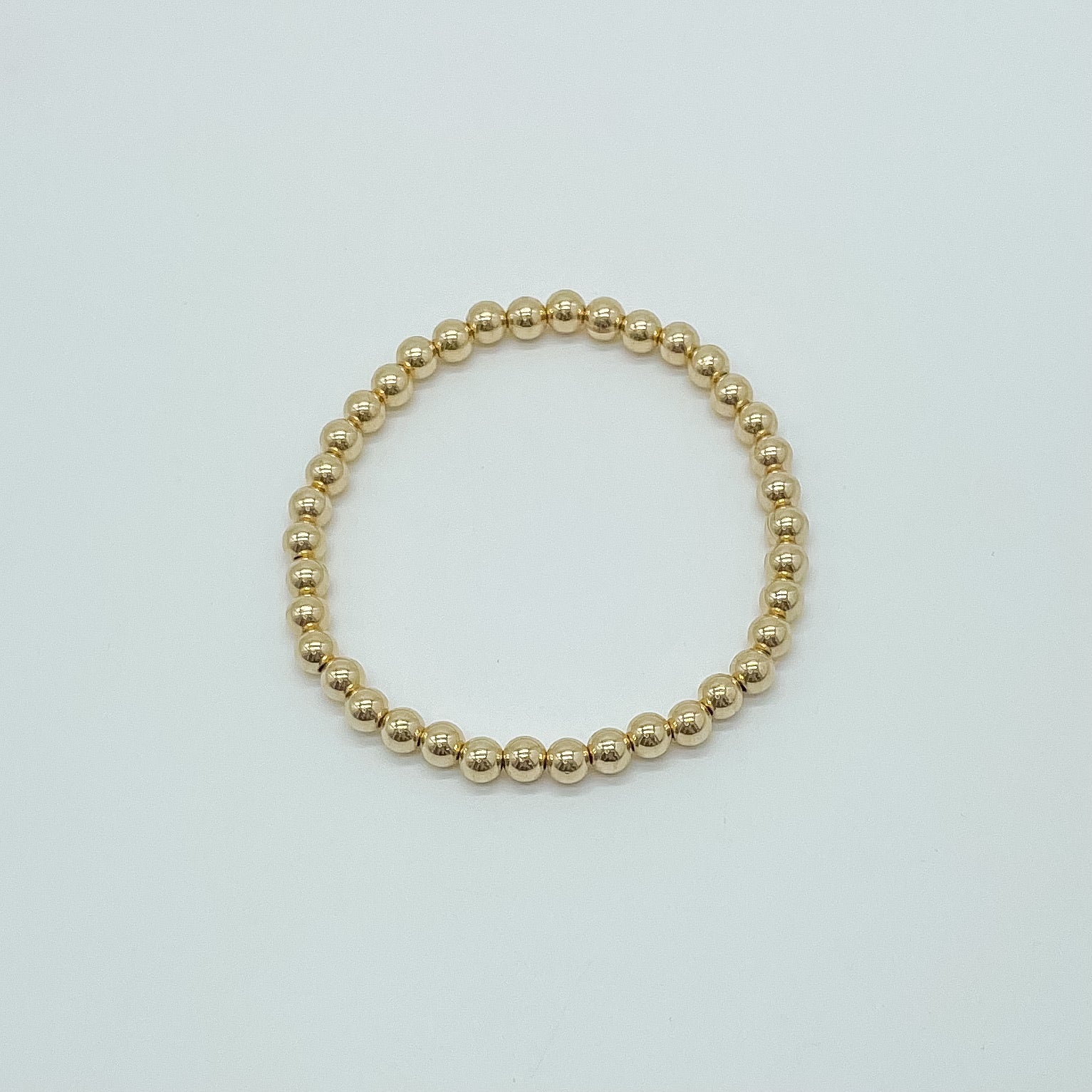 14k gold-filled beaded bracelet, classic bracelet, stack ideas, michigan made, rochester mi, 5mm beads, simple bracelet, elastic bracelet, handmade