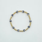 floral bracelet, beaded bracelet, elastic bracelet, statement bracelet, 14k gold filled bracelet, fall collection, fall accessories, stackable jewelry, dainty jewelry, essbe, small business, handmade, michigan made, navy porcelain looking bracelet beads