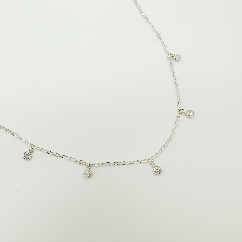 sterling silver necklace with cubic zirconia charms
