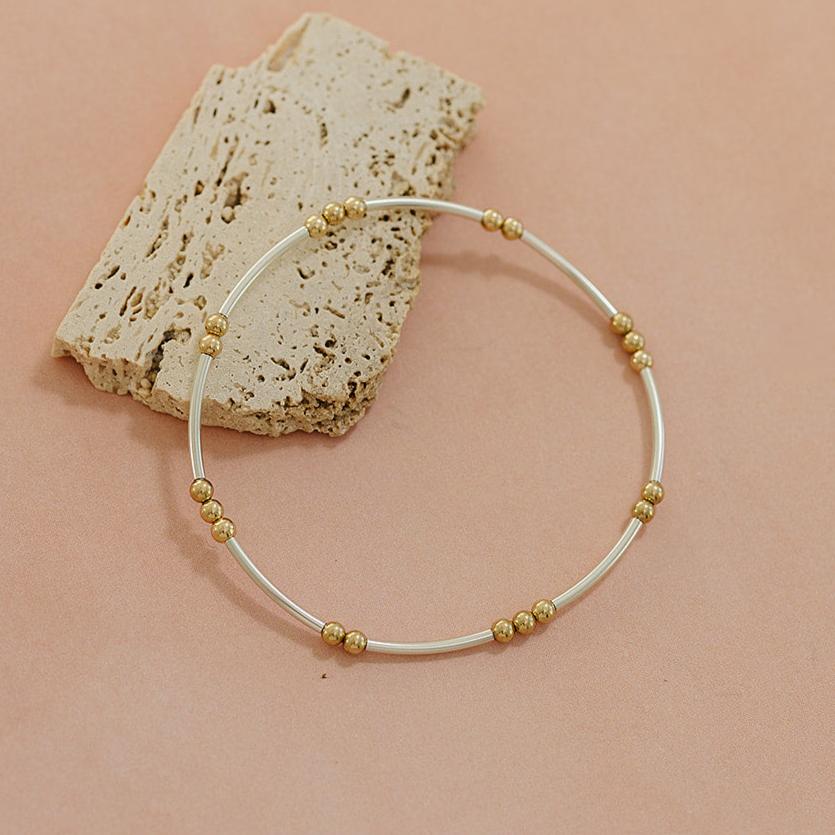 dot and dash beaded bracelet, elastic bracelet, curved tube bead, 14k gold-filled bracelet, sterling silver bracelet, mixed metal bracelet, small business, handmade, everyday jewelry, mixed metal jewelry