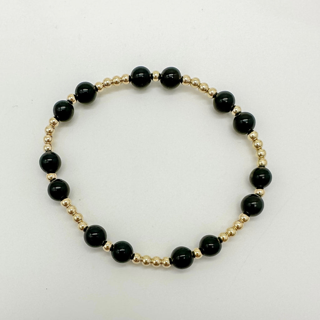 black beaded bracelet with gold-filled accents