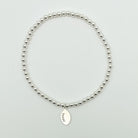 Football charm bracelet, Football accessories, small business, sterling silver, waterproof jewelry, beaded bracelet, elastic bracelet, charm bracelet, handmade, Michigan made, essbe, football season, braceket stack inspo