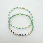 Michigan State accessories, MSU accessories, Green and white accessory, handmade, MSU bracelet, small business, Michigan made, Football jewelry, Game day jewelry, elastic bracelet, 14k gold-filled, waterproof jewelry, .925 sterling silver jewelry, game day jewelry, go green jewelry, bracelet stack, colorful bracelets