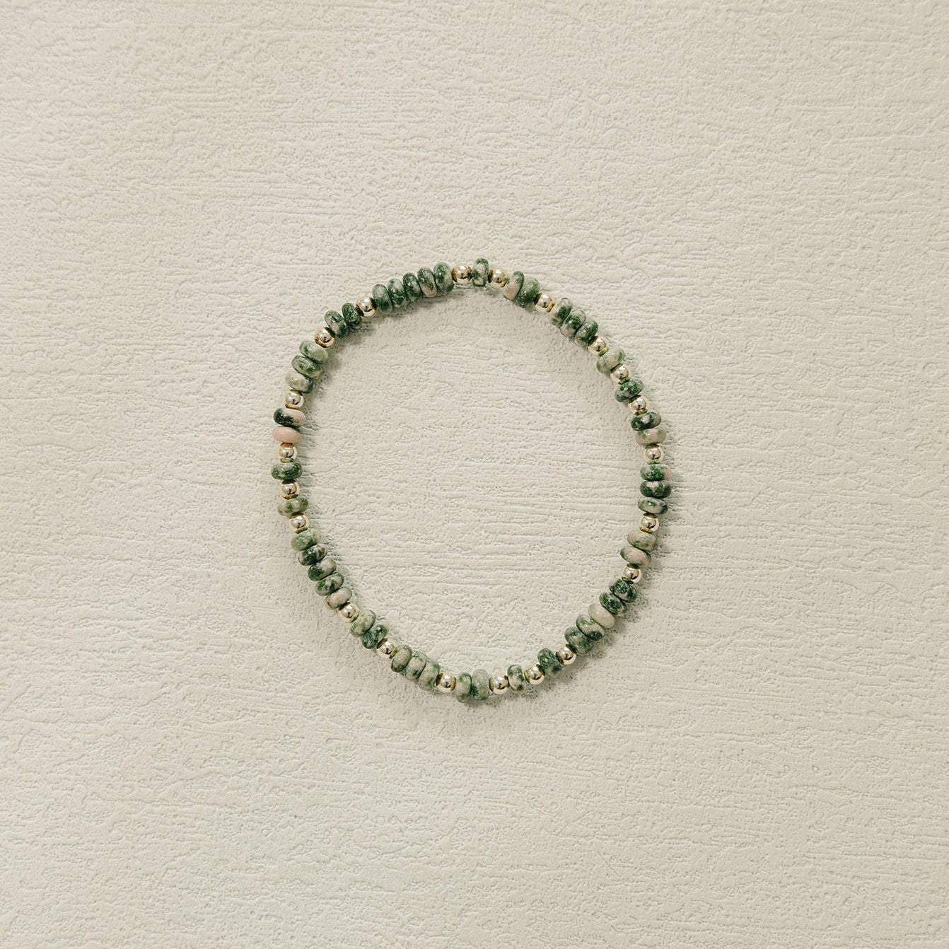 Millie beaded bracelet, handmade, small business, green beaded bracelet, green spot jasper beads, 3mm gold filled beads, michigan ,essbe, small buisness, fall bracelet, beaded bracelet, elastic bracelet, Michigan made, sterling silver beads