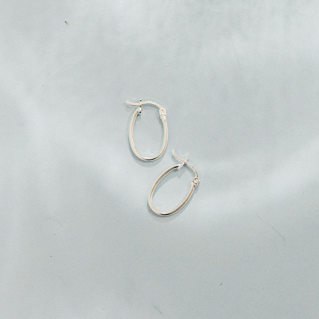 Oval hoops, dainty hoops, sterling silver hoops, everyday hoops, trendy hoop earrings, waterproof earrings, waterproof hoops, small business, essbe, michigan