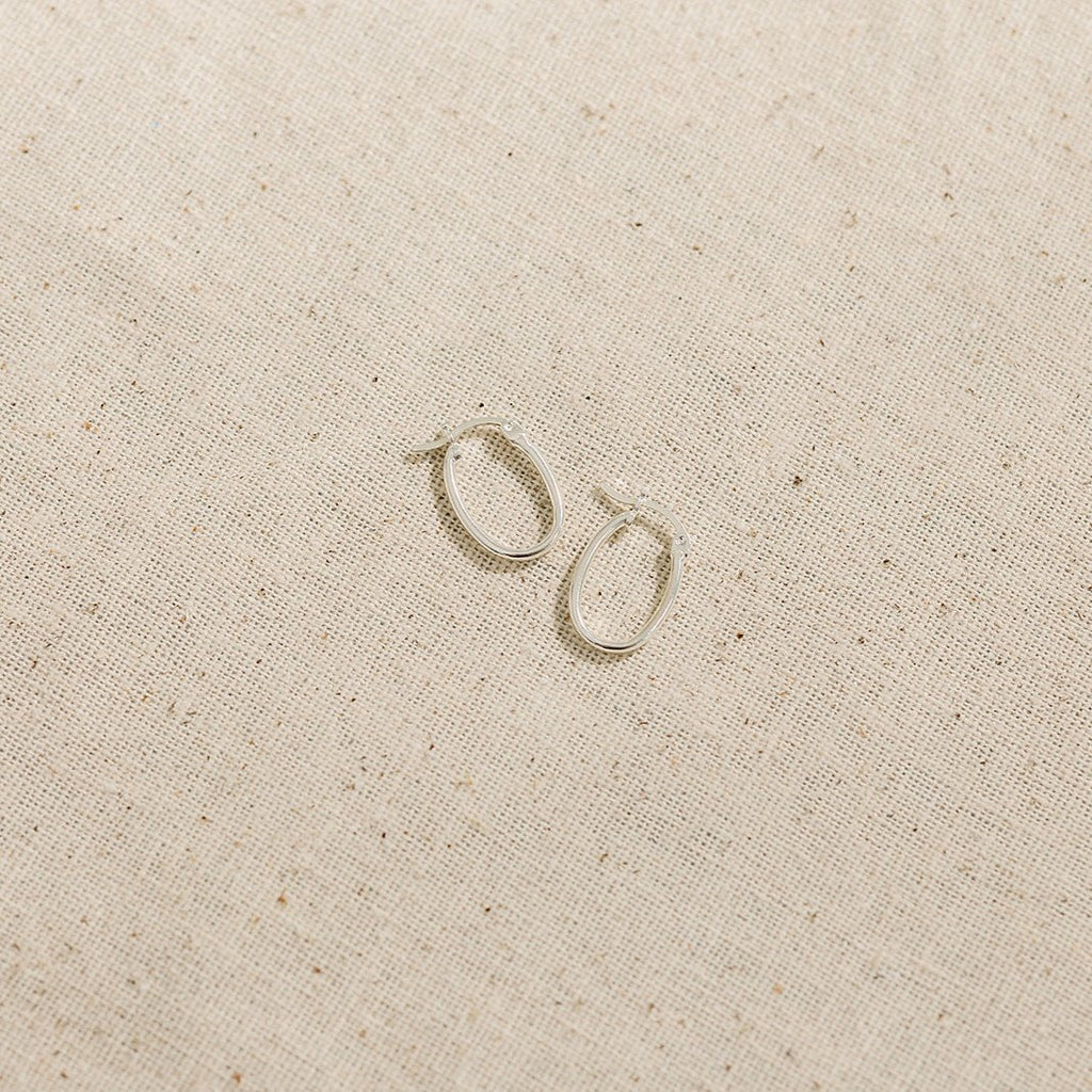 Oval hoops, dainty hoops, sterling silver hoops, everyday hoops, trendy hoop earrings, waterproof earrings, waterproof hoops, small business, essbe, michigan