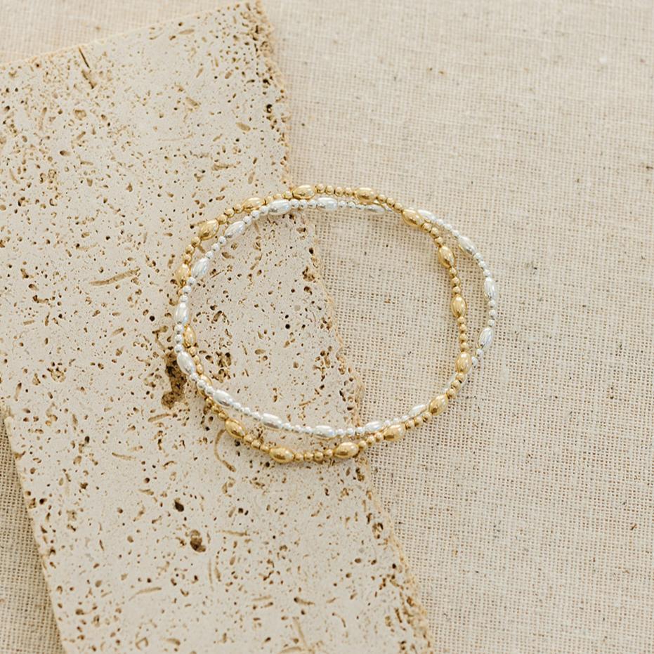 Penelope beaded bracelet, 14k gold filled bracelet, sterling silver bracelet, elastic bracelet, beaded bracelet, 2mm round beads, 5mm oval beads, oval beaded bracelet, elegant bracelet, small business, handmade, fall collection, michigan made, stackable bracelet