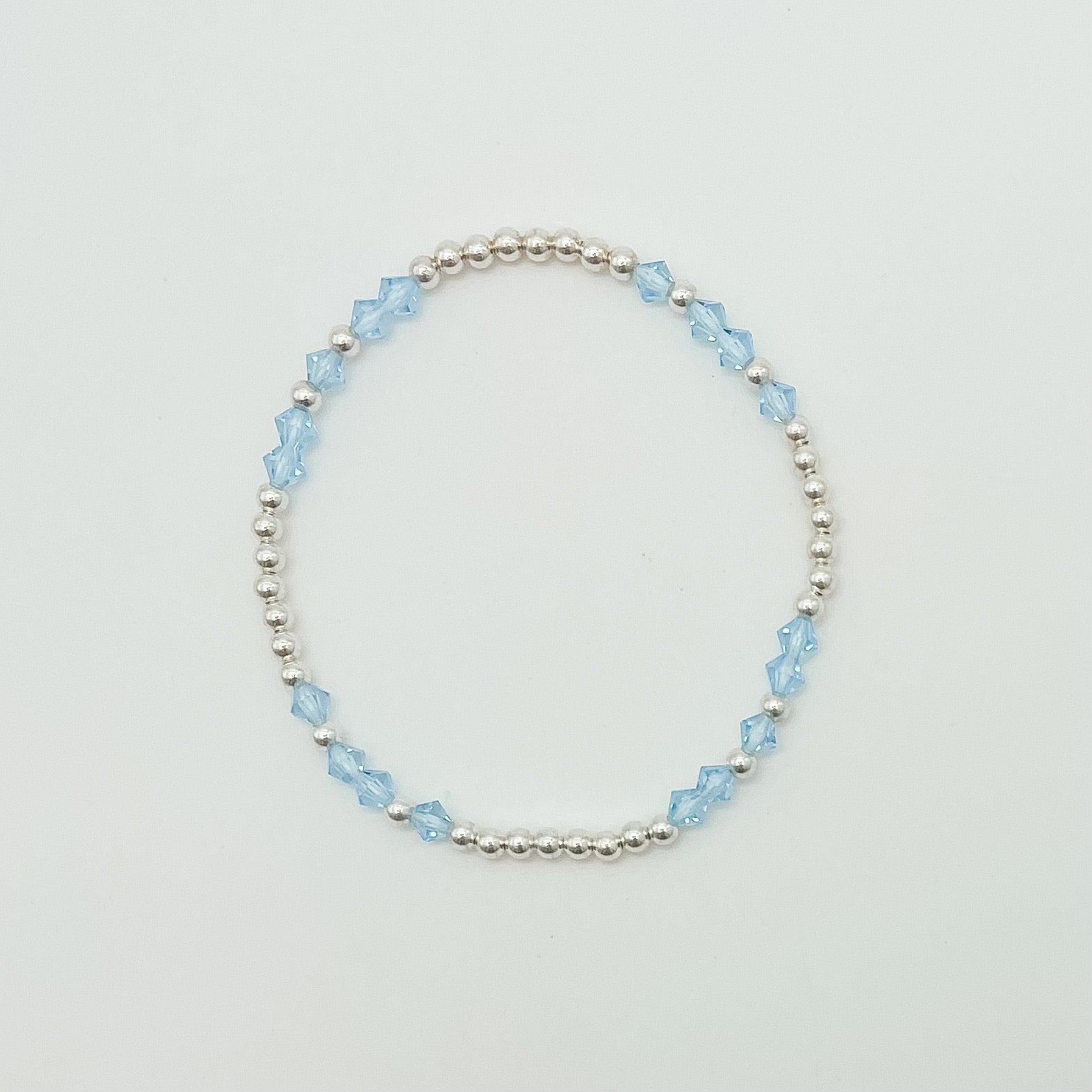 March bracelet, birthstone bracelet, elastic, sterling silver, small business, handmade, beaded bracelet, 3mm beads, dainty, stackable jewelry, blue zircon bracelet, 4mm beads, pop of color bracelet, semi-personalized gift, gift for her