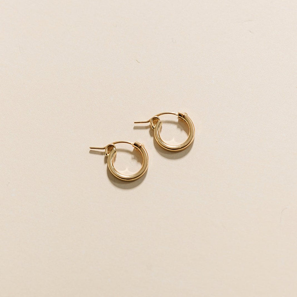 everyday hoops, gold-filled hoops, essbe, michigan, small business, gift idea for her, sterling silver hoops, simple hoops, waterproof earrings, trendy hoops, everyday jewelry, 13mm hoops, 19mm hoops, 29mm hoops