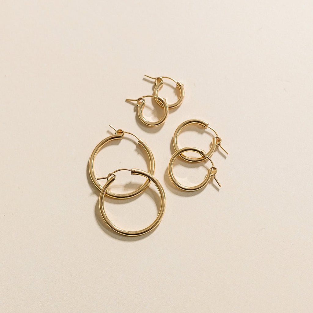 everyday hoops, gold-filled hoops, essbe, michigan, small business, gift idea for her, sterling silver hoops, simple hoops, waterproof earrings, trendy hoops, everyday jewelry, 13mm hoops, 19mm hoops, 29mm hoops