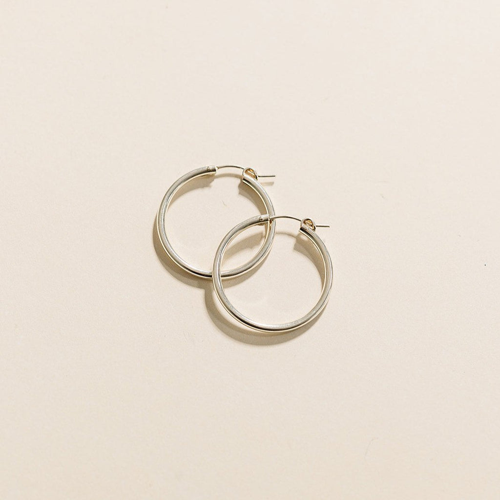 everyday hoops, gold-filled hoops, essbe, michigan, small business, gift idea for her, sterling silver hoops, simple hoops, waterproof earrings, trendy hoops, everyday jewelry, 13mm hoops, 19mm hoops, 29mm hoops