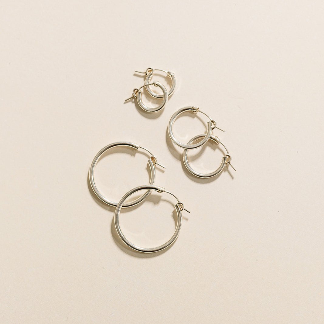 everyday hoops, gold-filled hoops, essbe, michigan, small business, gift idea for her, sterling silver hoops, simple hoops, waterproof earrings, trendy hoops, everyday jewelry, 13mm hoops, 19mm hoops, 29mm hoops