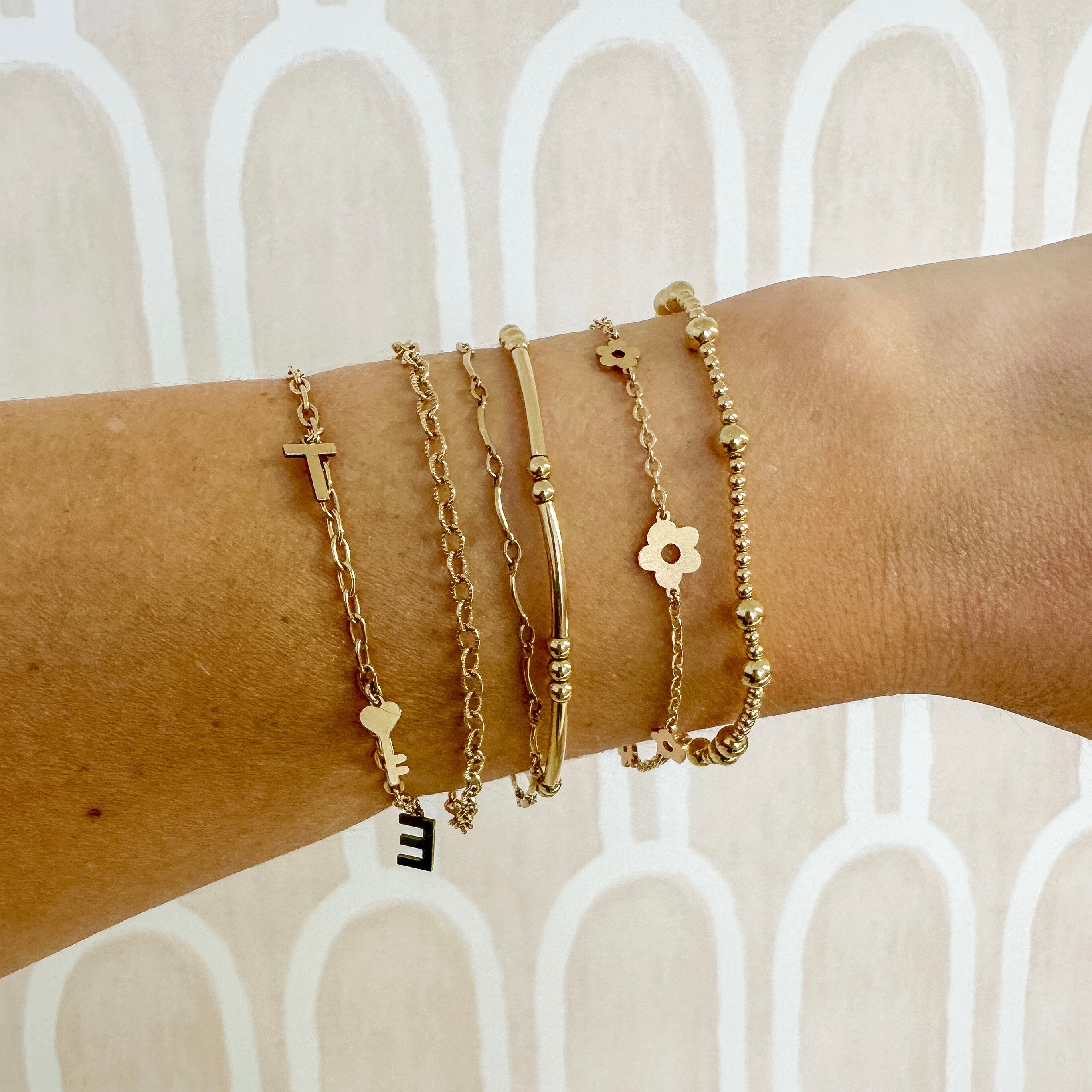 daisy charm bracelet, 14k-gold-filled, michigan made, essbe, rochester, summer jewelry, bracelet stack inspiration, small business, handmade