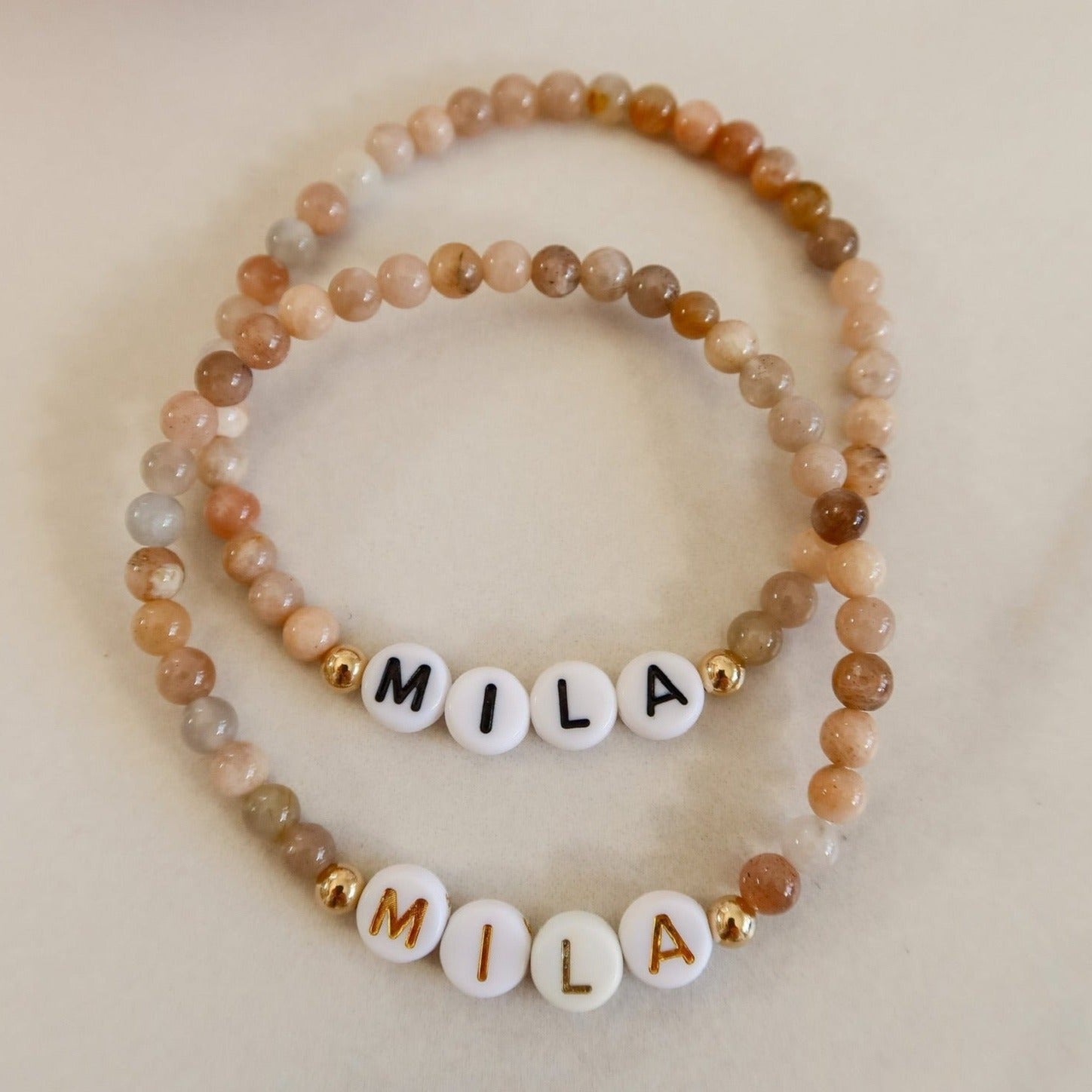 Personalized bracelets, elastic bracelets, beaded bracelet, gold-filled bracelet, dainty bracelet, handmade, essbe, small business, name bracelet, letter bead bracelets, caramel beads