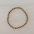 Seeded beaded bracelet, black, made in michigan, gold-filled bracelet, Seeded beaded bracelet, white, made in michigan, gold-filled bracelet, small business, essbe, handmade, dainty jewelry, stackable jewelry, elastic bracelet, beaded bracelet, gold-filled bracelet