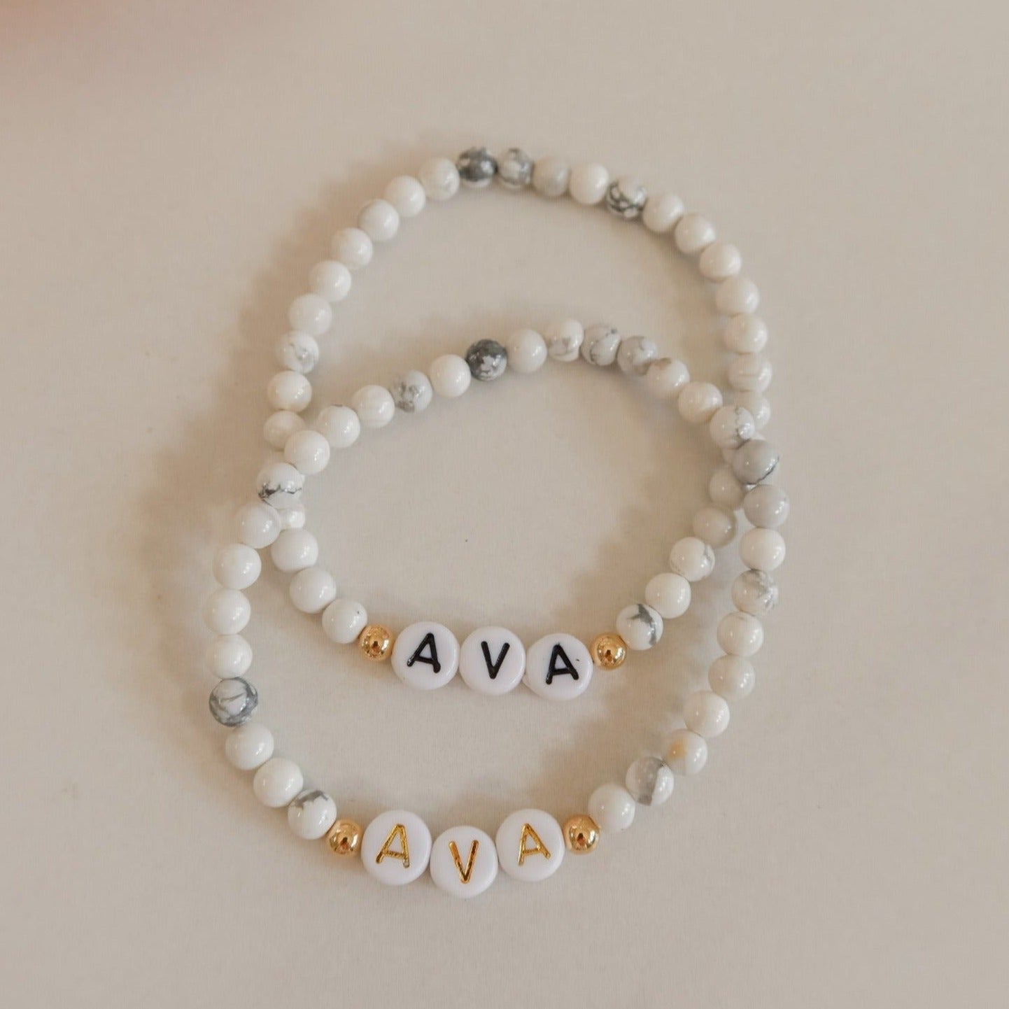 Personalized bracelets, elastic bracelets, beaded bracelet, gold-filled bracelet, dainty bracelet, handmade, essbe, small business, name bracelet, letter bead bracelets