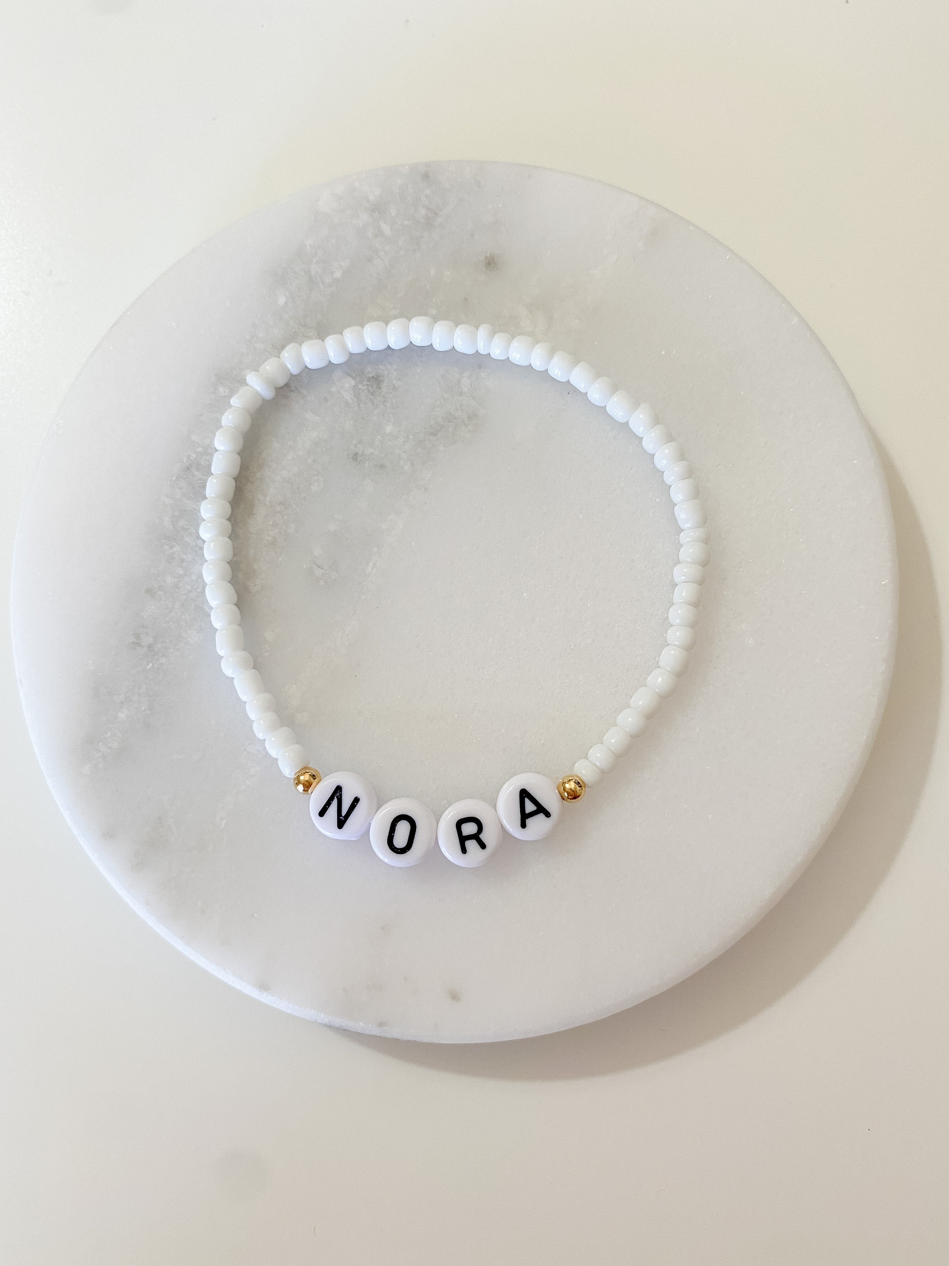 Personalized bracelets, elastic bracelets, beaded bracelet, gold-filled bracelet, dainty bracelet, handmade, essbe, small business, name bracelet, letter bead bracelets