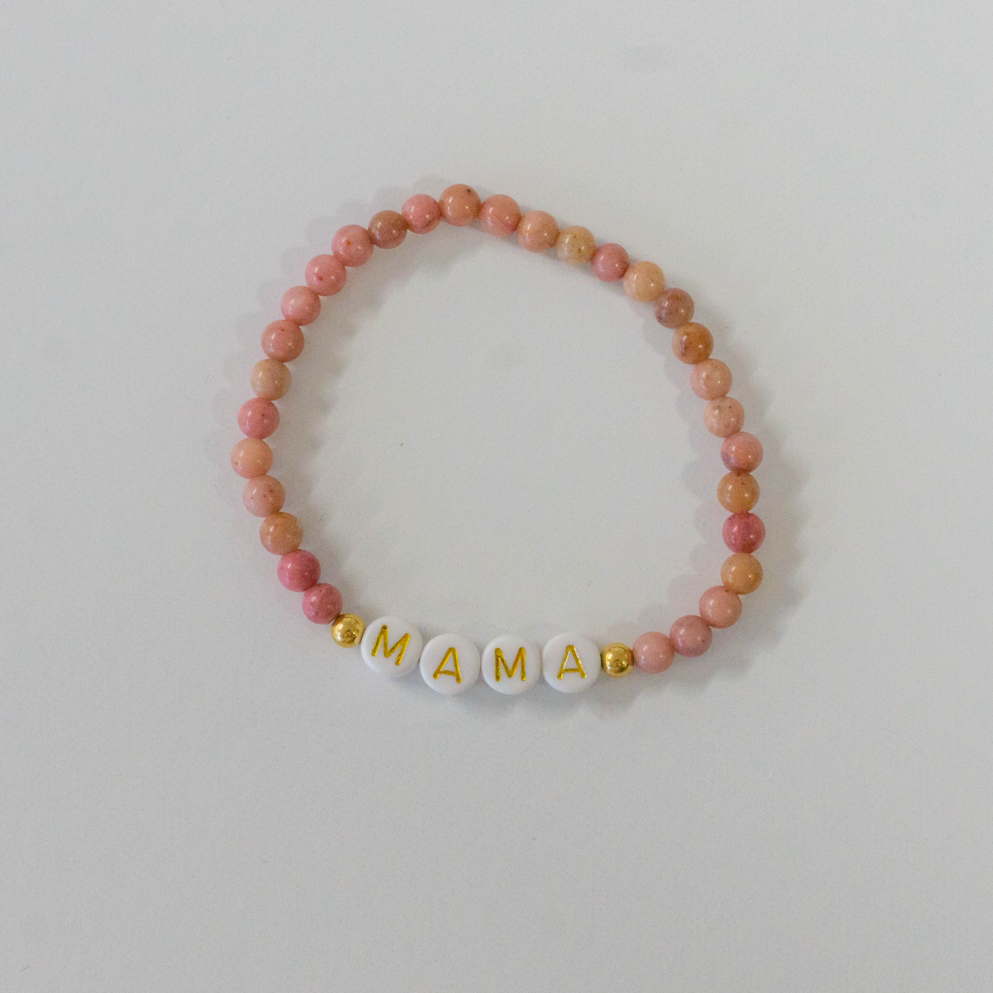 Personalized bracelets, elastic bracelets, beaded bracelet, gold-filled bracelet, dainty bracelet, handmade, essbe, small business, name bracelet, letter bead bracelets, pink bracelet, pink beaded bracelet